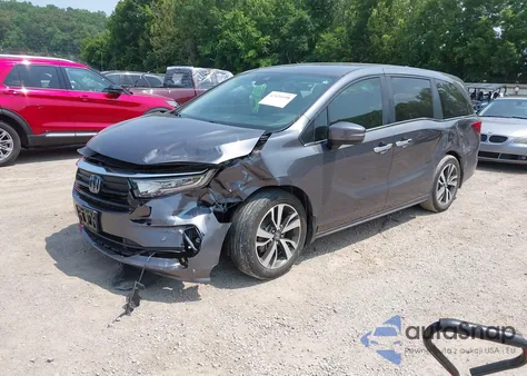 2022 Honda Odyssey Touring z USA, uszkodzony, nr VIN 5FNRL6H83NB023583
